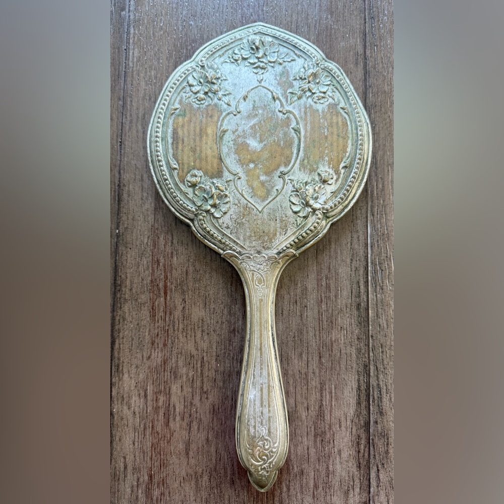 Vintage Handheld Mirror with Floral Design